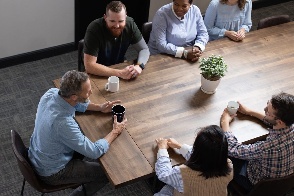 CHM employees meeting with member Kirk Cameron